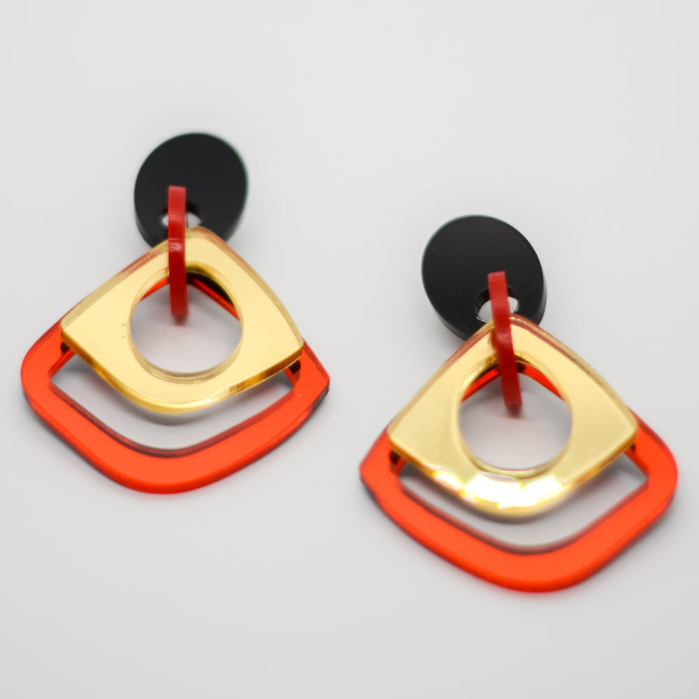 Eslabones - Tope negro, Argolla Rojo Sólido, Rojo Espejo y Dorado Espejado.