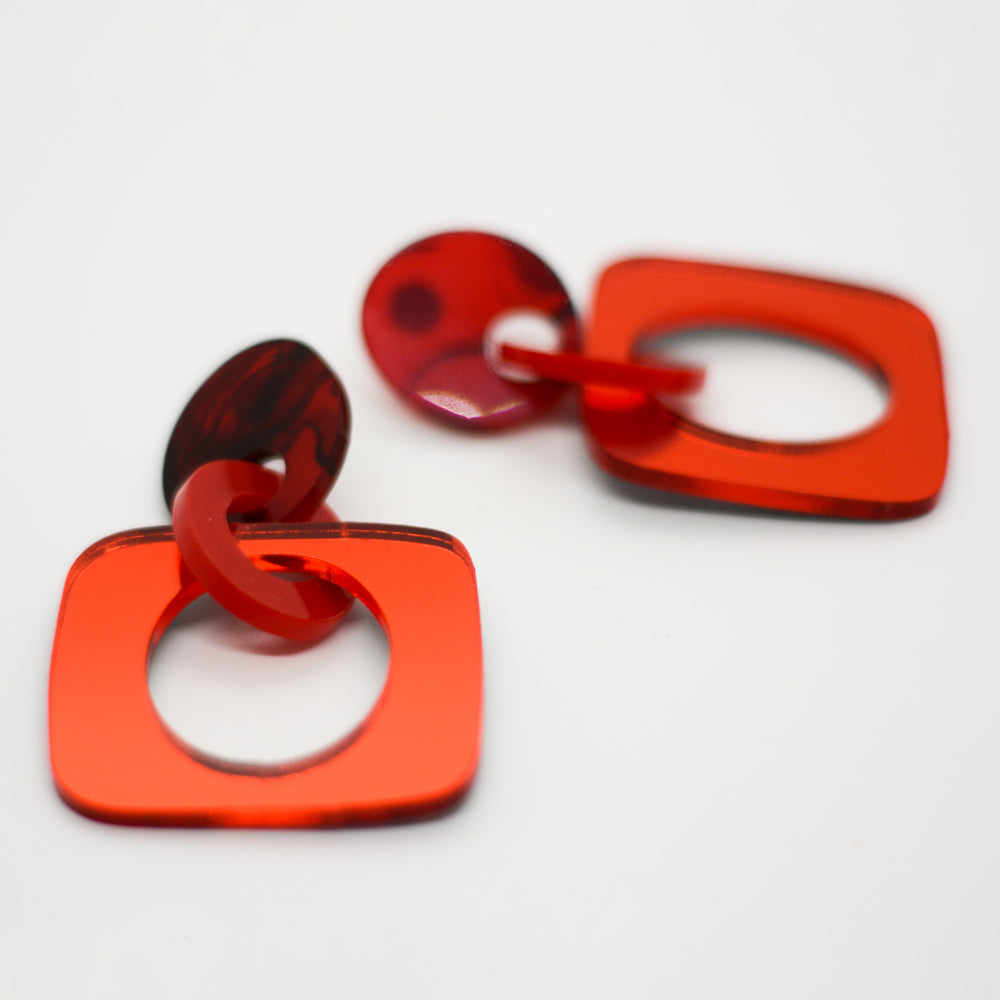 Eslabones - Tope Mármol Rojo y Negro, Argolla Rojo Sólido y Rojo Espejado