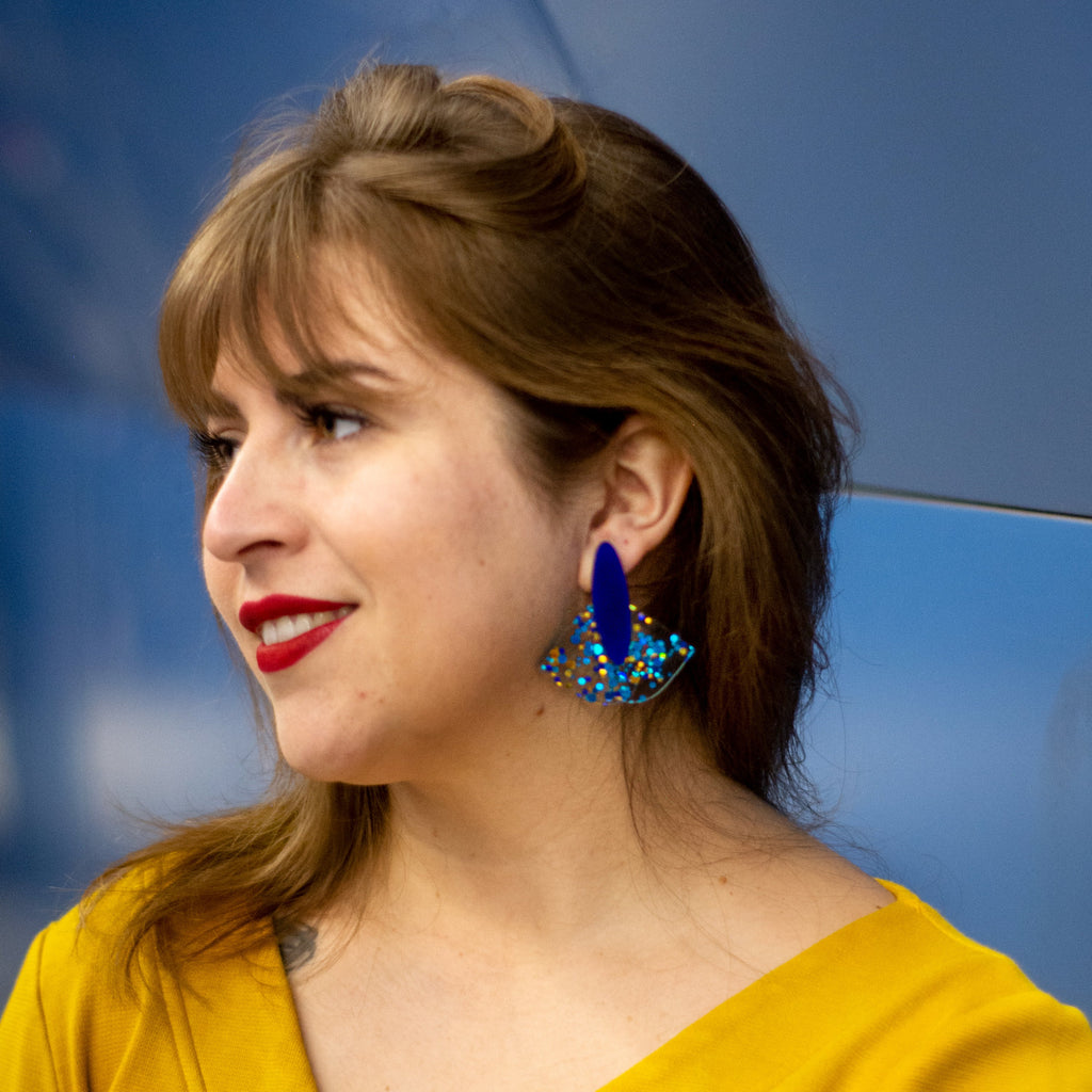 Células grandes color Azul con puntos celestes con dorado