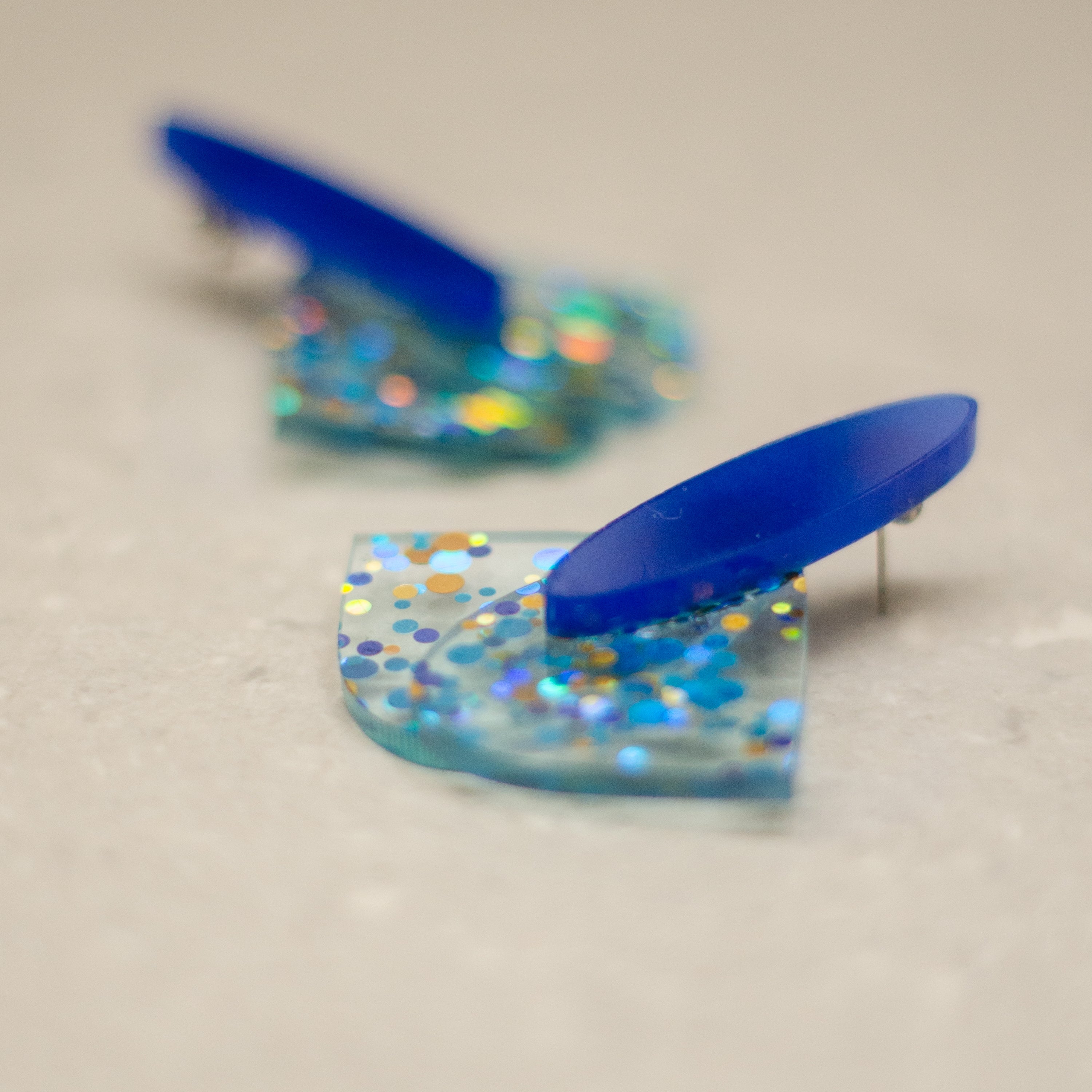 Células grandes color Azul con puntos celestes con dorado