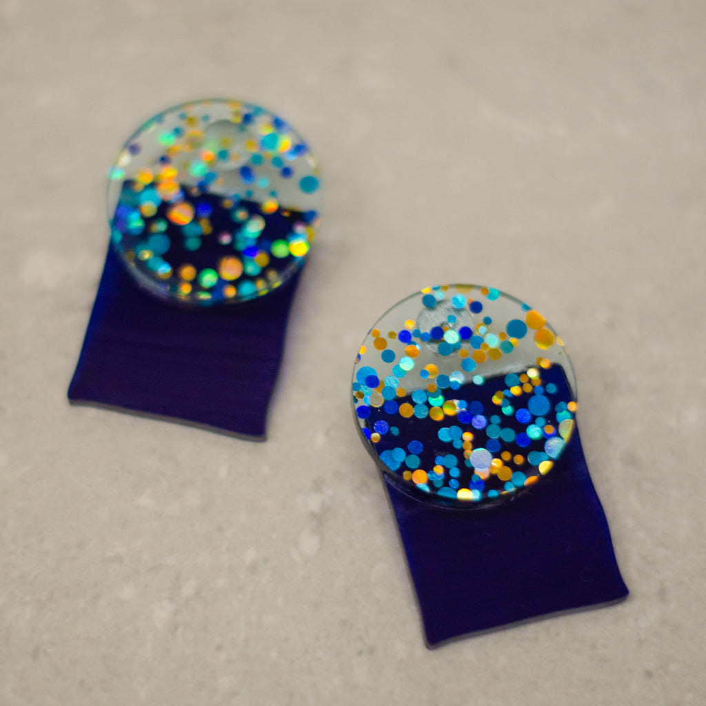 Células tralúcido con  puntos celestes con dorado y azul