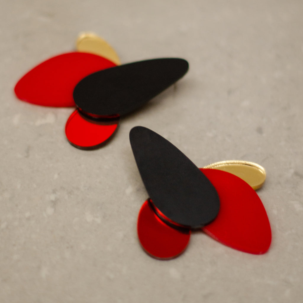 Células color Negro mate, Rojo sólido, Rojo espejo y Dorado espejo